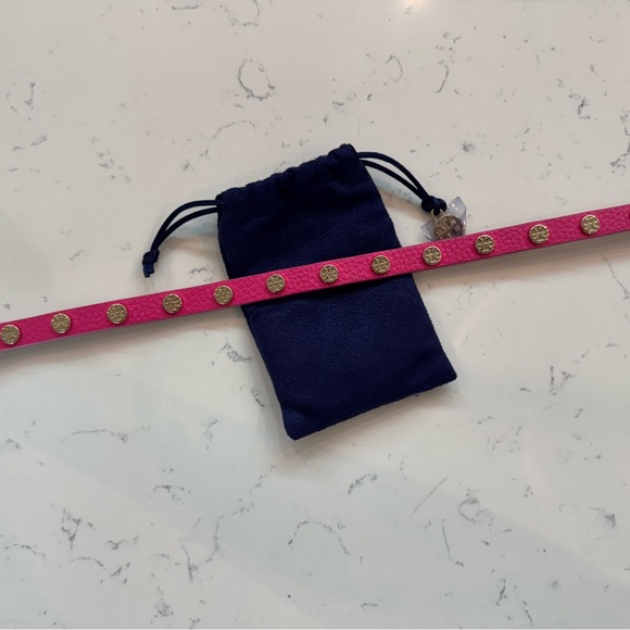 Tory Burch Wrap Around Hot Pink Leather Bracelet.
Color: Hot Pink - Picture 4 of 4